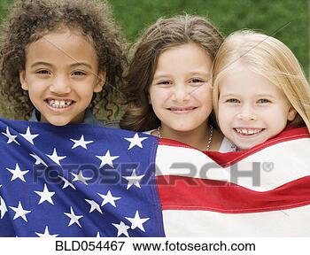 Picture - multi-ethnic girls 
holding american 
flag. fotosearch 
- search stock 
photos, pictures, 
images, and photo 
clipart