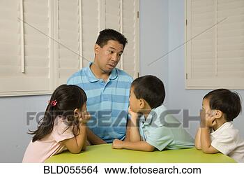 Stock Photo - asian father talking 
to children. fotosearch 
- search stock 
photos, pictures, 
images, and photo 
clipart