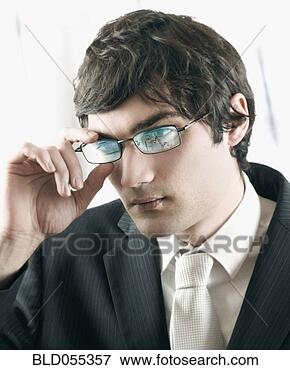 Picture - european businessman 
with reflection 
on eyeglasses. 
fotosearch - search 
stock photos, 
pictures, images, 
and photo clipart