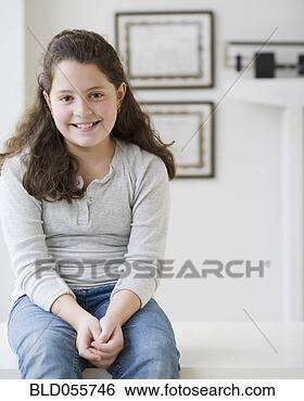 Stock Photo - hispanic girl 
in doctor’s office. 
fotosearch - search 
stock photos, 
pictures, images, 
and photo clipart