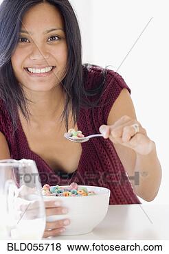 Stock Photo - pacific islander 
woman eating cereal. 
fotosearch - search 
stock photos, 
pictures, images, 
and photo clipart