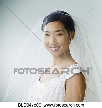 Stock Photography - asian bride wearing 
veil. fotosearch 
- search stock 
photos, pictures, 
images, and photo 
clipart