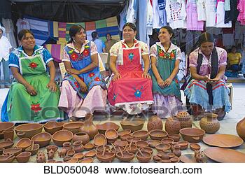 Stock Photo - group of indigenous 
mexican women 
selling pottery. 
fotosearch - search 
stock photos, 
pictures, images, 
and photo clipart
