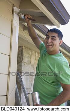 Stock Photo - hispanic man painting 
house exterior. 
fotosearch - search 
stock photos, 
pictures, images, 
and photo clipart