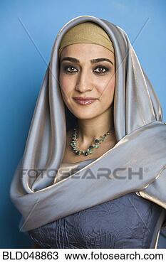 Stock Photo - middle eastern 
woman wearing 
head scarf. fotosearch 
- search stock 
photos, pictures, 
images, and photo 
clipart