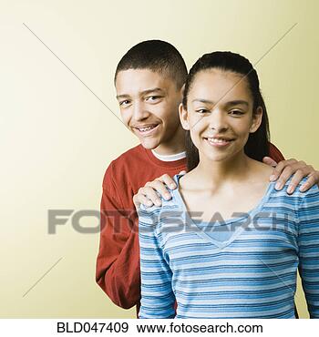 Stock Photograph - mixed race boy 
with hands on 
friend’s shoulders. 
fotosearch - search 
stock photos, 
pictures, images, 
and photo clipart