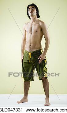 Stock Photography - mixed race man 
wearing bathing 
suit. fotosearch 
- search stock 
photos, pictures, 
images, and photo 
clipart