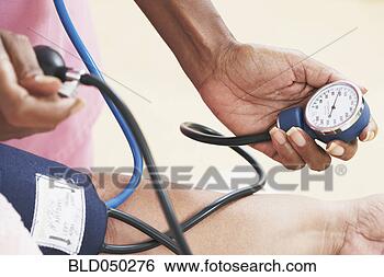 Stock Photo - nurse taking senior’s 
blood pressure. 
fotosearch - search 
stock photos, 
pictures, images, 
and photo clipart