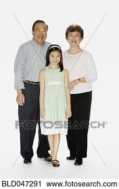 Stock Photography - portrait of asian 
grandparents and 
granddaughter. 
fotosearch - search 
stock photos, 
pictures, images, 
and photo clipart
