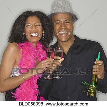 Stock Photo - african couple 
drinking champagne. 
fotosearch - search 
stock photos, 
pictures, images, 
and photo clipart