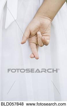 Stock Photo - mixed race girl 
with fingers crossed. 
fotosearch - search 
stock photos, 
pictures, images, 
and photo clipart