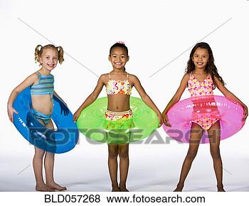 Stock Photo - multi-ethnic girls 
wearing bathing 
suits. fotosearch 
- search stock 
photos, pictures, 
images, and photo 
clipart