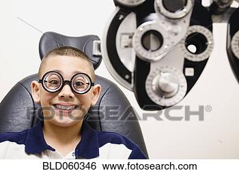 Stock Photo - asian boy in eye 
doctor’s office. 
fotosearch - search 
stock photos, 
pictures, images, 
and photo clipart