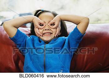 Stock Photo - asian girl being 
silly. fotosearch 
- search stock 
photos, pictures, 
images, and photo 
clipart