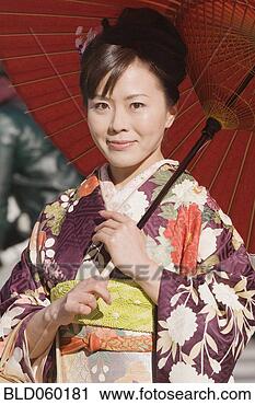 Stock Photography - asian woman in 
traditional dress. 
fotosearch - search 
stock photos, 
pictures, images, 
and photo clipart