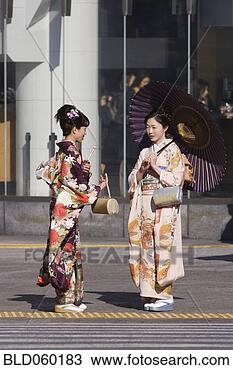 Stock Photo - asian women in 
traditional dress. 
fotosearch - search 
stock photos, 
pictures, images, 
and photo clipart