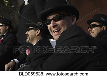 Stock Photo - hispanic men wearing 
sunglasses and 
tuxedos. fotosearch 
- search stock 
photos, pictures, 
images, and photo 
clipart