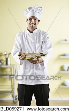 Stock Photography - native american 
male chef holding 
plate of food. 
fotosearch - search 
stock photos, 
pictures, images, 
and photo clipart