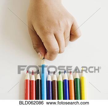 Stock Photo - close up of mixed 
race girl choosing 
colored pencil. 
fotosearch - search 
stock photos, 
pictures, images, 
and photo clipart