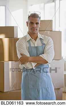 Stock Photo - hispanic man wearing 
apron and protective 
eyewear. fotosearch 
- search stock 
photos, pictures, 
images, and photo 
clipart