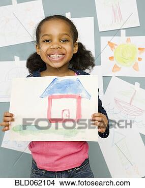 Stock Photo - mixed race girl 
holding water 
color painting 
of a house. fotosearch 
- search stock 
photos, pictures, 
images, and photo 
clipart