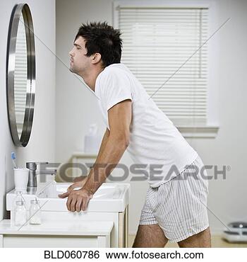 Stock Photo - native american 
man looking in 
mirror. fotosearch 
- search stock 
photos, pictures, 
images, and photo 
clipart