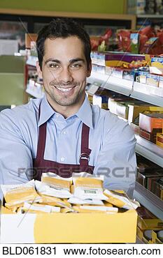 Stock Photography - pacific islander 
clerk in health 
food store. fotosearch 
- search stock 
photos, pictures, 
images, and photo 
clipart
