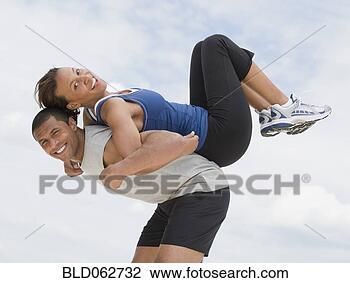 Stock Photo - african couple 
in athletic clothing. 
fotosearch - search 
stock photos, 
pictures, images, 
and photo clipart
