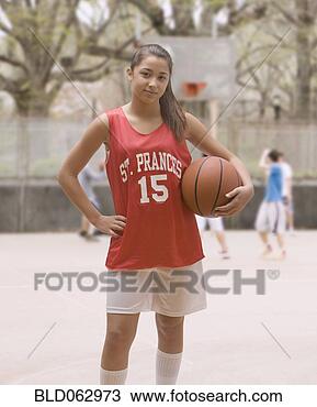 Stock Photo - mixed race girl 
wearing basketball 
uniform. fotosearch 
- search stock 
photos, pictures, 
images, and photo 
clipart
