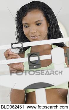 Stock Photography - panamanian woman 
on scale. fotosearch 
- search stock 
photos, pictures, 
images, and photo 
clipart