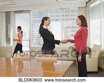 Stock Photo - businesswoman 
greeting job candidate. 
fotosearch - search 
stock photos, 
pictures, images, 
and photo clipart