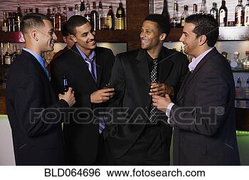 Stock Photo - group of multi-ethnic 
businessmen drinking 
in bar. fotosearch 
- search stock 
photos, pictures, 
images, and photo 
clipart