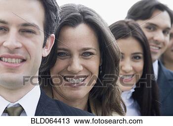 Stock Photo - hispanic co-workers 
standing in row. 
fotosearch - search 
stock photos, 
pictures, images, 
and photo clipart