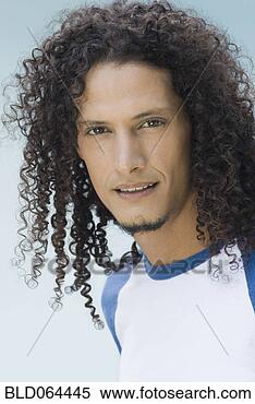 Stock Image - hispanic man with 
long, curly hair. 
fotosearch - search 
stock photos, 
pictures, images, 
and photo clipart