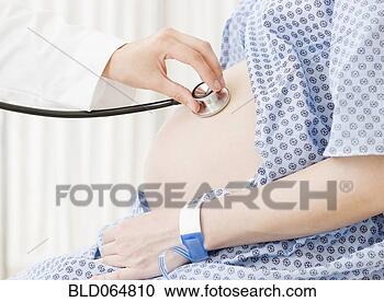 Stock Photography - pregnant asian 
woman having checkup 
in doctor’s office. 
fotosearch - search 
stock photos, 
pictures, images, 
and photo clipart
