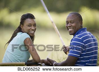 Stock Photo - african husband 
and wife fishing. 
fotosearch - search 
stock photos, 
pictures, images, 
and photo clipart
