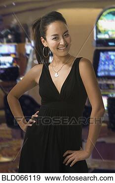 Stock Photograph - glamorous mixed 
race woman in 
casino. fotosearch 
- search stock 
photos, pictures, 
images, and photo 
clipart