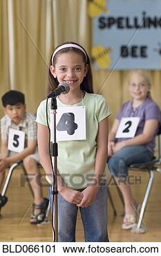 Stock Photography - hispanic girl 
giving answer 
in spelling bee. 
fotosearch - search 
stock photos, 
pictures, images, 
and photo clipart