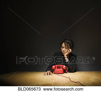 Stock Photo - sad businesswoman 
waiting for telephone 
to ring. fotosearch 
- search stock 
photos, pictures, 
images, and photo 
clipart
