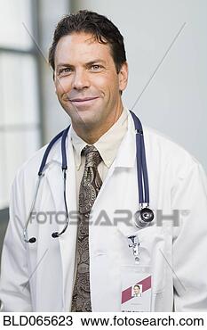 Stock Photo - smiling doctor 
in lab coat and 
stethoscope. fotosearch 
- search stock 
photos, pictures, 
images, and photo 
clipart