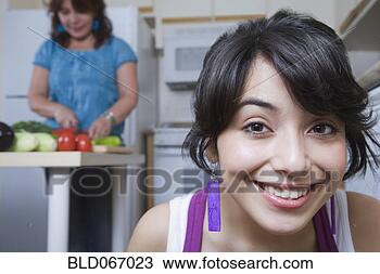 Stock Photo - young woman anticipating 
homemade meal. 
fotosearch - search 
stock photos, 
pictures, images, 
and photo clipart