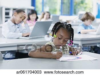 Stock Photo - children sitting 
in a classroom 
at school working 
on laptops. fotosearch 
- search stock 
photos, pictures, 
images, and photo 
clipart