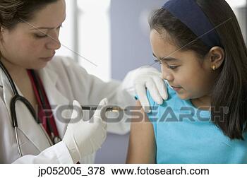 Stock Photo - female doctor 
giving injection 
to a girl. fotosearch 
- search stock 
photos, pictures, 
images, and photo 
clipart