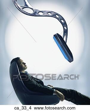 Stock Photo - man in high technology 
environment. fotosearch 
- search stock 
photos, pictures, 
images, and photo 
clipart