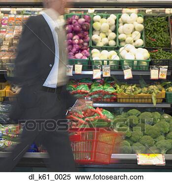 Stock Image - blurry view of 
man walking by 
produce in supermarket, 
perth, australia. 
fotosearch - search 
stock photos, 
pictures, images, 
and photo clipart