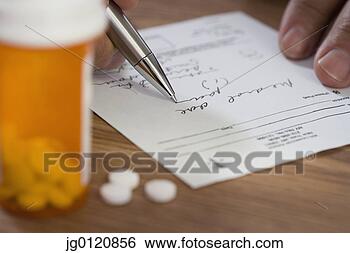 Stock Photo - close up of man 
filling out prescription. 
fotosearch - search 
stock photos, 
pictures, images, 
and photo clipart