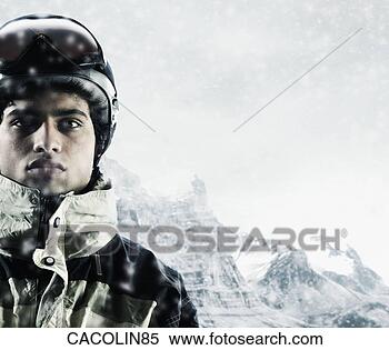 Stock Image - portrait of a 
young man standing 
outdoors in winter 
clothing looking. 
fotosearch - search 
stock photos, 
pictures, images, 
and photo clipart