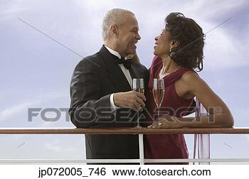 Stock Photo - formal couple 
drinking wine 
together. fotosearch 
- search stock 
photos, pictures, 
images, and photo 
clipart