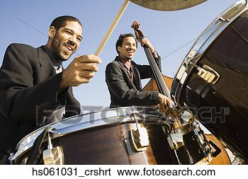Stock Photo - jazz band playing 
outdoors. fotosearch 
- search stock 
photos, pictures, 
images, and photo 
clipart