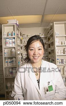 Stock Photo - portrait of a 
female pharmacist 
in a pharmacy. 
fotosearch - search 
stock photos, 
pictures, images, 
and photo clipart